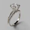 Split Shank Four Prong Solitaire Moissanite Engagement Ring