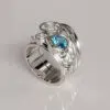 Custom Bridal Set with Blue Sapphire Accents and 1.50 ct Moissanite Center Stone