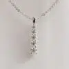 Graduated Moissanite Drop Pendant