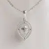 Double Halo Pear-Cut Moissanite Pendant