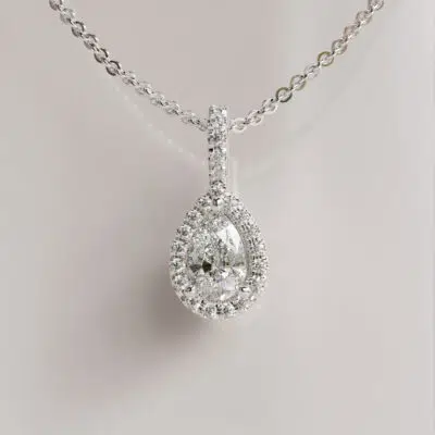 Halo Pear-Cut Moissanite Pendant in Classic Elegance
