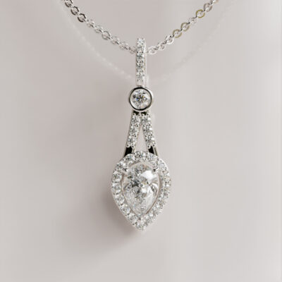 Pear-Cut Moissanite Pendant with Bezel-Set Accent and Halo