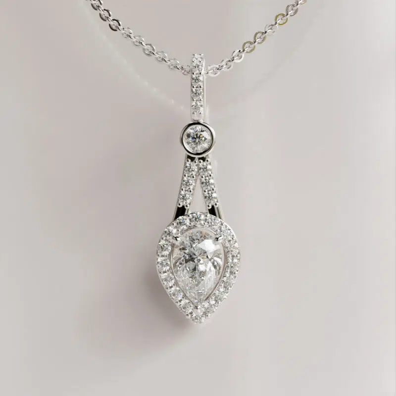 Pear-Cut Moissanite Pendant with Bezel-Set Accent and Halo